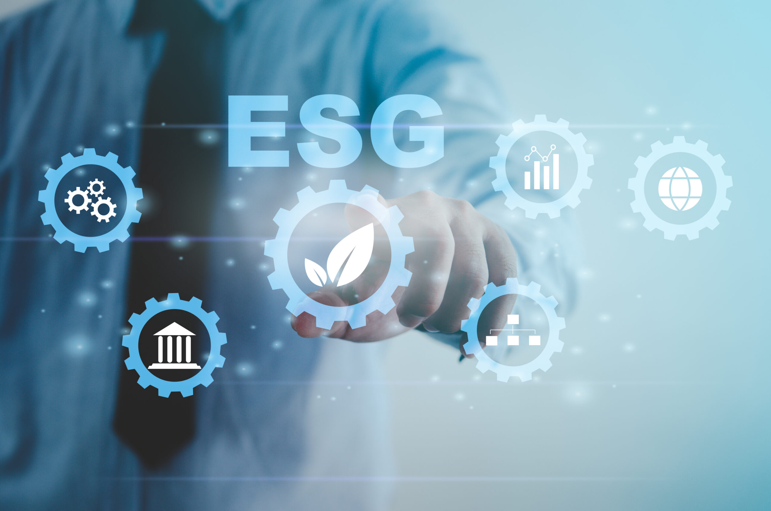 person pointing to screen with ESG on it